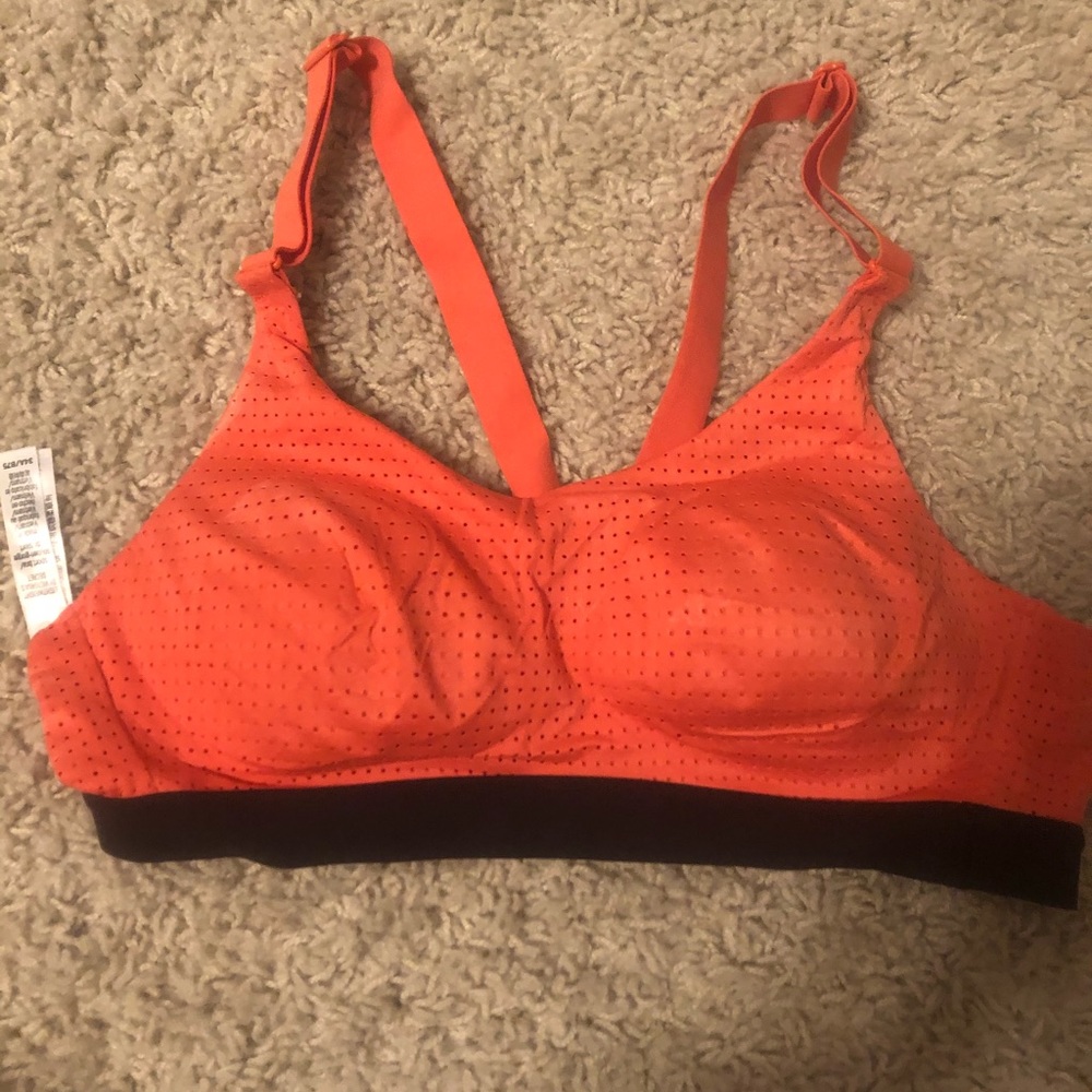 Victoria’s Secret orange sports bra